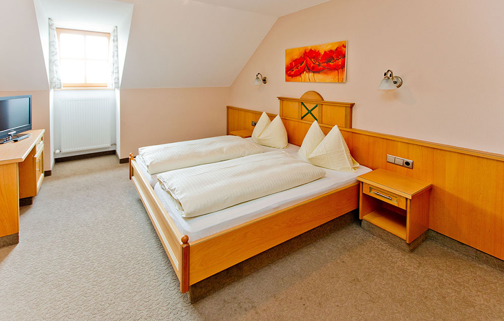 Schlafzimmer im Appartement im Bauernhaus Laschenskygut